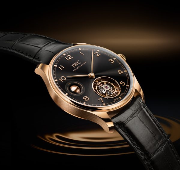 PORTUGIESER HAND WOUND TOURBILLON WITH A GLOBE SHAPED DAY AND NIGHT INDICATION PORTUGIESER HAND WOUND TOURBILLON WITH A GLOBE SHAPED DAY AND NIGHT INDICATION